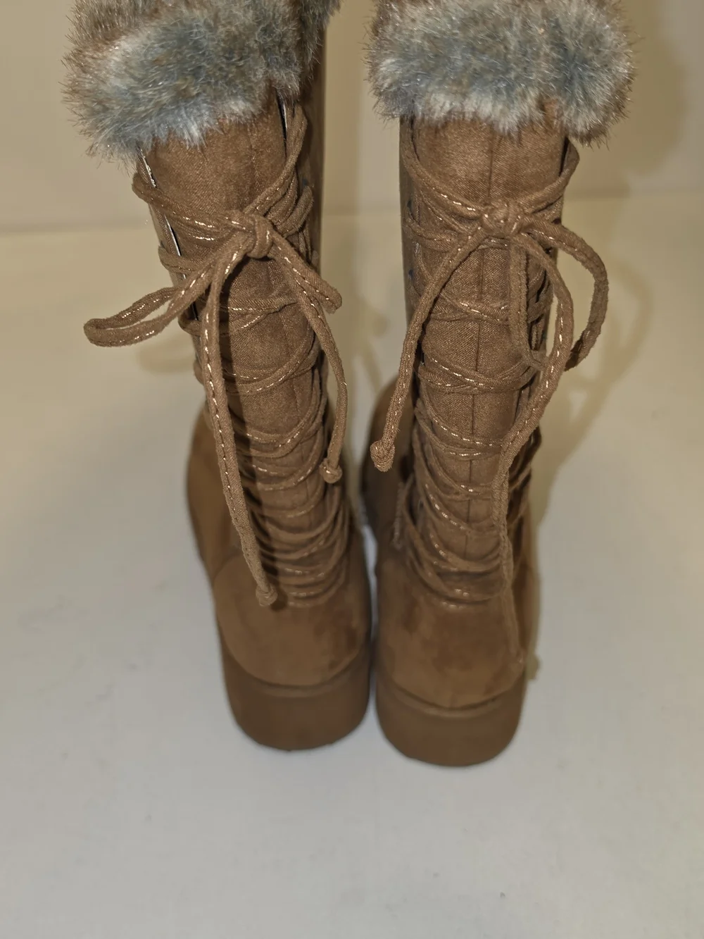 Rampage Ram-Perie micro suede boots featuring a distinct lace-up back design